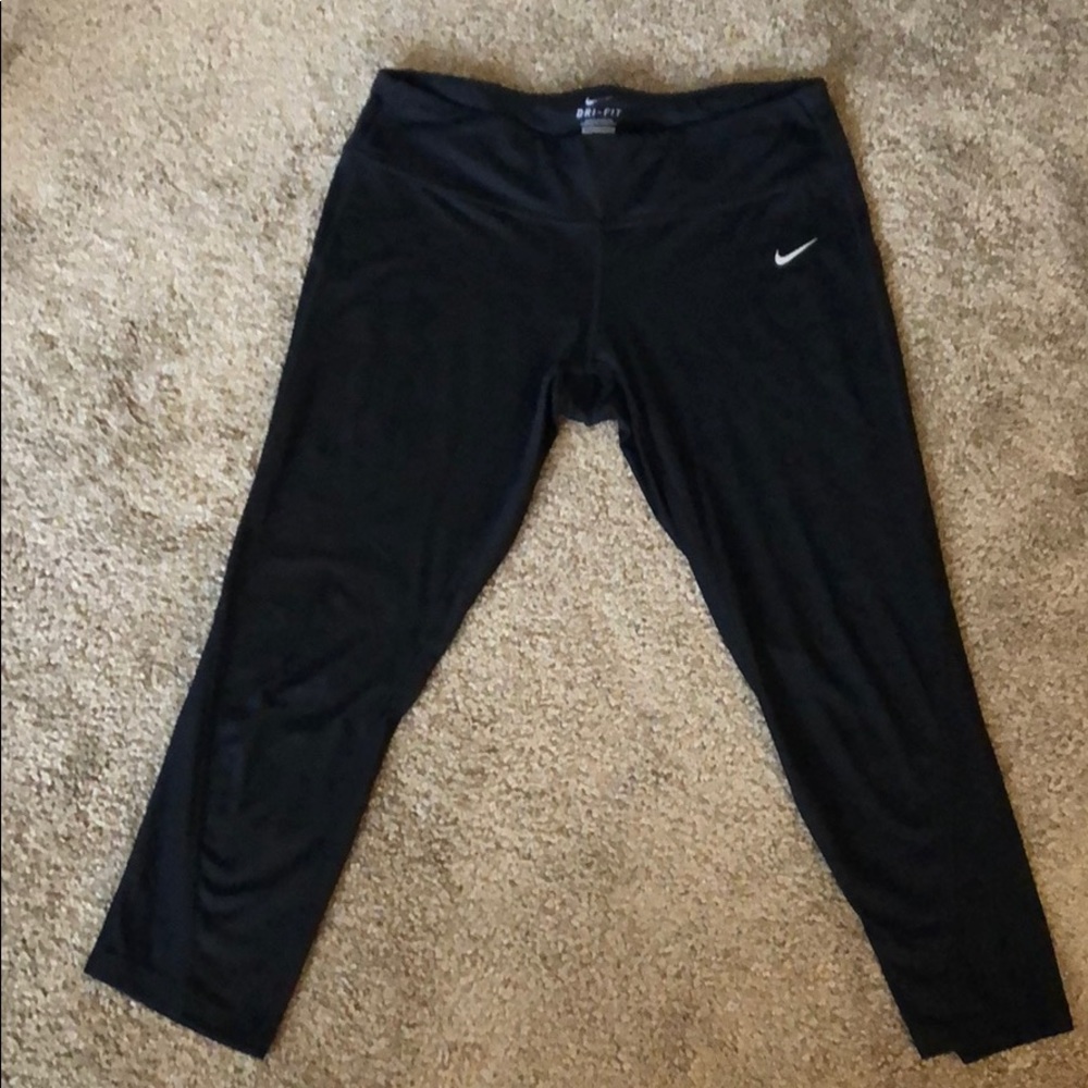 Nike dri-fit capris with mesh accent.